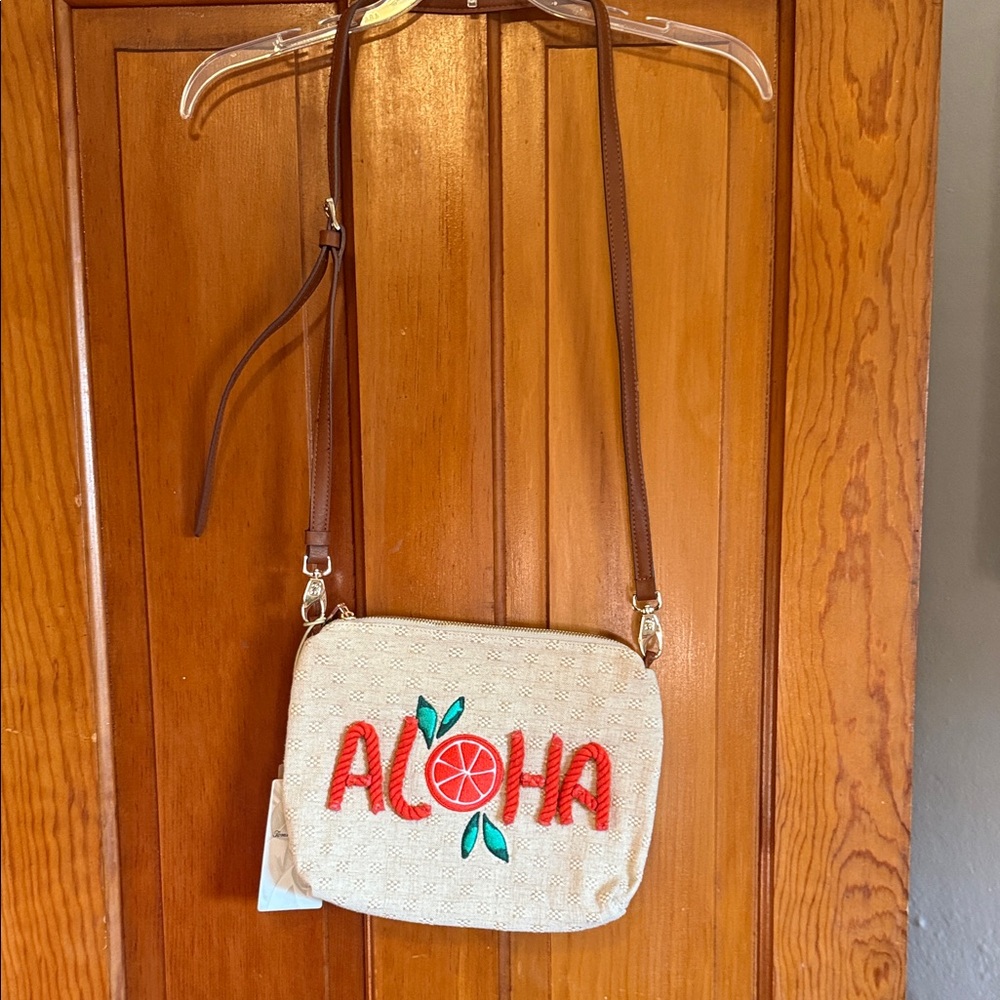 Tommy Bahama Beige Crossbody Bag with Red Aloha Design